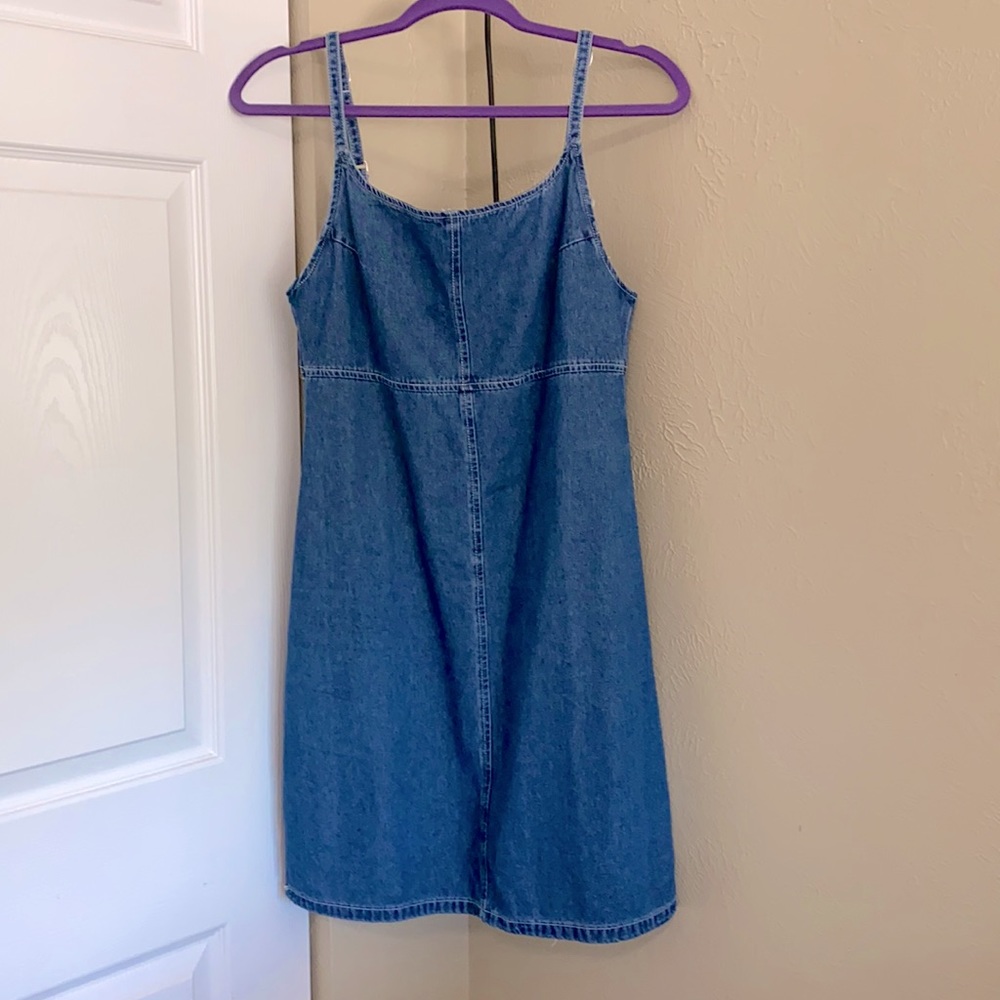 Medium wash denim mini dress.
